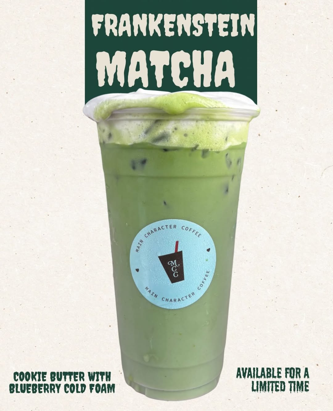 The Frankenstein Matcha seasonal special in a Main Character Coffee branded cup: iced green matcha with cookie butter and blueberry cold foam